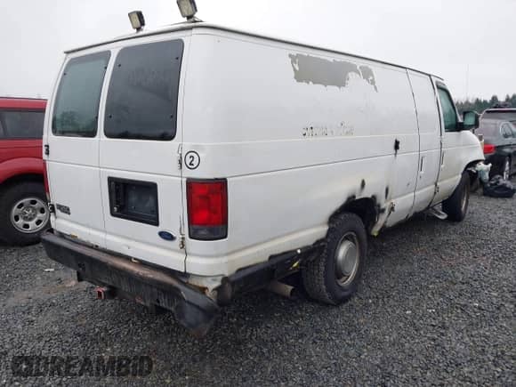 2004 Ford Econoline Cargo with VIN 1FTSS34L84HA56056, listed as a IAAI auction lot 41235862 with 215,095 mi miles and . Bid and sale history available at DreamBid. Image 4.