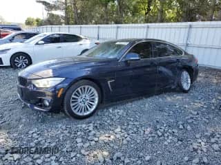 2015 BMW 4 Series 428i xDrive z VIN WBA4C9C55FD330350, wystawiony jako Copart lot #69912125 z przebiegiem 177 235 mil mil oraz Szkoda całkowita • Salvage title. Historia ofert i sprzedaży dostępna na DreamBid. Obrazek 1.