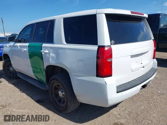 2015 Chevrolet Tahoe Commercial with VIN 1GNLC2EC8FR255526, listed as a IAAI auction lot 42538320 with 165,502 mi miles and . Bid and sale history available at DreamBid. Image 6.