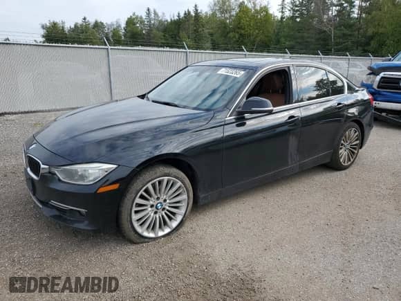 2015 BMW 3 Series 328i xDrive with VIN WBA3B3G52FNR85436, listed as a Copart auction lot 71523265 with 306,860 mi miles and Clean title. Bid and sale history available at DreamBid. Image 1.