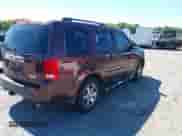 2009 Honda Pilot Touring with VIN 5FNYF48939B005946, listed as a IAAI auction lot 43178572 with 158,130 mi miles and . Bid and sale history available at DreamBid. Image 4.