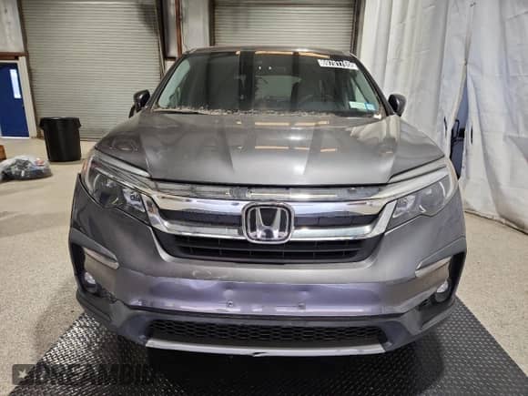2020 Honda Pilot EX z VIN 5FNYF6H39LB042935, wystawiony jako Copart lot #69701765 z przebiegiem 29 958 mil mil oraz Czysty tytuł • Clean title. Historia ofert i sprzedaży dostępna na DreamBid. Obrazek 5.