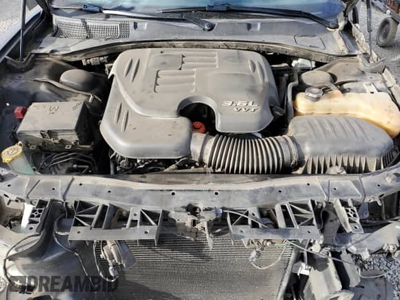 2016 Dodge Charger SE z VIN 2C3CDXBG2GH251939, wystawiony jako Copart lot #85944585 z przebiegiem 218 934 mil mil oraz Szkoda całkowita • Salvage title. Historia ofert i sprzedaży dostępna na DreamBid. Obrazek 11.