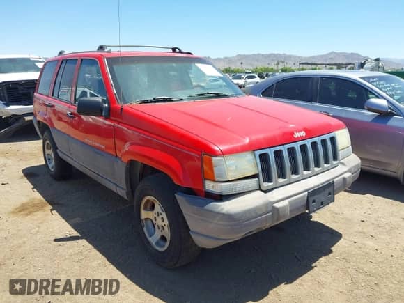 1996 Jeep Grand Cherokee Laredo z VIN 1J4GZ58Y5TC183677, wystawiony jako IAAI lot #42582989 z przebiegiem 187 453 mil mil oraz . Historia ofert i sprzedaży dostępna na DreamBid. Obrazek 6.