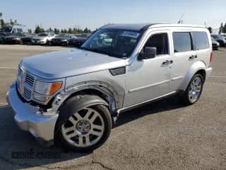 2011 Dodge Nitro Heat with VIN 1D4PT4GX6BW500621, listed as a Copart auction lot 81958685 with 171,892 mi miles and Salvage title. Bid and sale history available at DreamBid. Image 1.