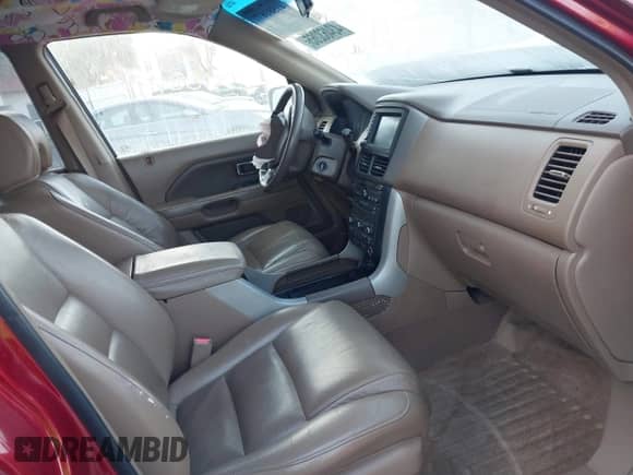 2006 Honda Pilot EX-L z VIN 5FNYF28726B044736, wystawiony jako IAAI lot #41581677 z przebiegiem 216 070 mil mil oraz . Historia ofert i sprzedaży dostępna na DreamBid. Obrazek 5.