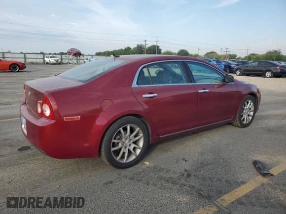 2009 Chevrolet Malibu LTZ with VIN 1G1ZK57B59F191360, listed as a Copart auction lot 68979695 with 165,640 mi miles and Salvage title. Bid and sale history available at DreamBid. Image 3.