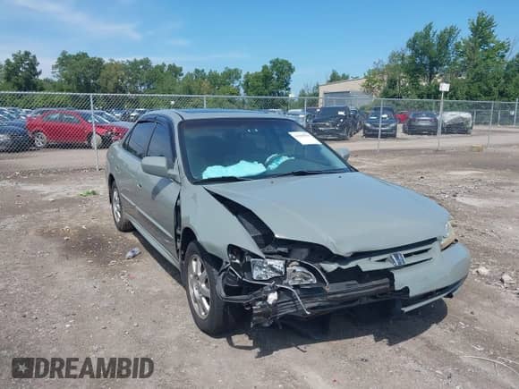 2002 Honda Accord SE with VIN 1HGCG56702A097418, listed as a IAAI auction lot 42840939 with 146,216 mi miles and . Bid and sale history available at DreamBid. Image 1.