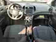 2012 Chevrolet Sonic LT z VIN 1G1JD6SH6C4175051, wystawiony jako Copart lot #67231065 z przebiegiem 197 299 mil mil oraz Szkoda całkowita • Salvage title. Historia ofert i sprzedaży dostępna na DreamBid. Obrazek 8.