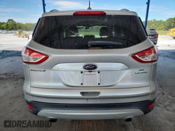 2014 Ford Escape SE с VIN 1FMCU0GX7EUC49282, выставлен на аукционе Copart как лот 70480785 с пробегом 148 032 миль миль и Чистый • Clean title. История ставок и продаж доступна на DreamBid. Изображение 6.