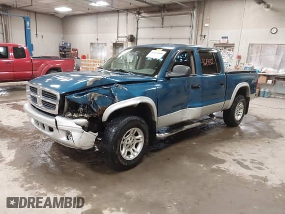 2003 Dodge Dakota SLT z VIN 1D7HG48N03S204480, wystawiony jako IAAI lot #41619868 z przebiegiem 135 359 mil mil oraz . Historia ofert i sprzedaży dostępna na DreamBid. Obrazek 2.