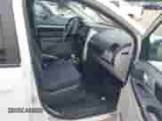 2010 Dodge Grand Caravan SXT with VIN 2D4RN5D16AR342815, listed as a IAAI auction lot 43043040 with 302,074 mi miles and . Bid and sale history available at DreamBid. Image 5.