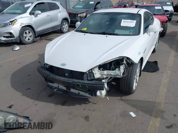 2008 Hyundai Tiburon GT z VIN KMHHN66F88U289731, wystawiony jako IAAI lot #41561487 z przebiegiem 145 944 mil mil oraz . Historia ofert i sprzedaży dostępna na DreamBid. Obrazek 6.