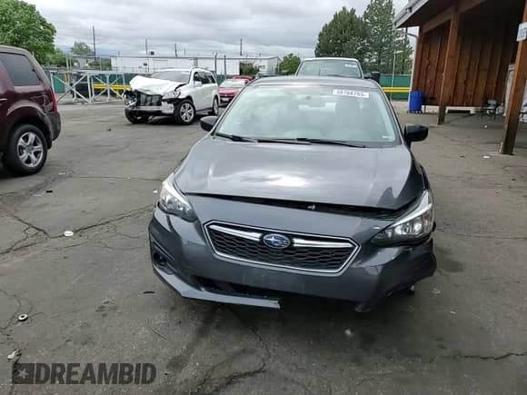 2018 Subaru Impreza with VIN 4S3GKAA65J1607654, listed as a Copart auction lot 58768765 with 62,275 mi miles and Salvage title. Bid and sale history available at DreamBid. Image 13.