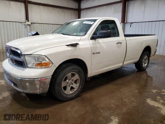 2009 Dodge 1500 SLT с VIN 1D3HB16P79J516569, выставлен на аукционе Copart как лот 53142355 с пробегом 156 439 миль миль и Списание • Salvage title. История ставок и продаж доступна на DreamBid. Изображение 1.