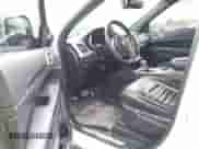 2018 Jeep Grand Cherokee Sterling with VIN 1C4RJFBG7JC263183, listed as a IAAI auction lot 41801205 with 104,301 mi miles and . Bid and sale history available at DreamBid. Image 5.