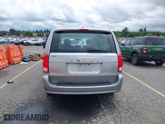 2016 Dodge Grand Caravan SE with VIN 2C4RDGBG9GR182599, listed as a IAAI auction lot 42431587 with 101,167 mi miles and . Bid and sale history available at DreamBid. Image 17.