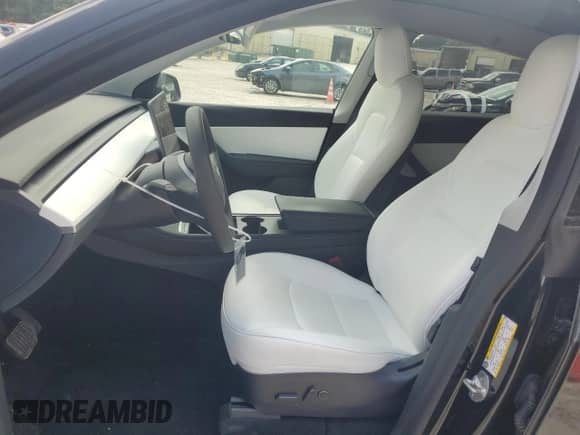 2022 Tesla Model Y Long Range with VIN 7SAYGDEE9NF455340, listed as a Copart auction lot 66966654 with 22,707 mi miles and Salvage title. Bid and sale history available at DreamBid. Image 7.