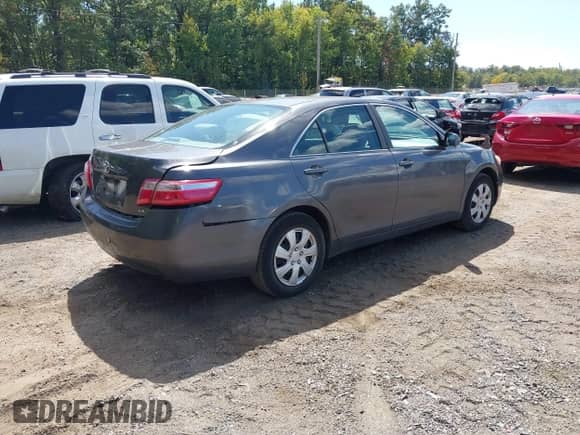 2009 Toyota Camry LE with VIN 4T1BE46K39U882986, listed as a IAAI auction lot 43165118 with 107,427 mi miles and . Bid and sale history available at DreamBid. Image 4.