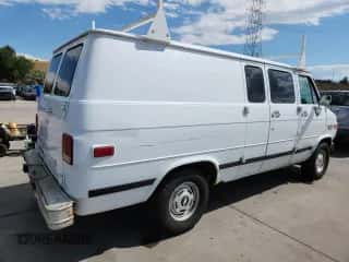 1993 Chevrolet Chevy Van z VIN 1GCEG25H3PF340021, wystawiony jako Copart lot #69375045 z przebiegiem 106 197 mil mil oraz Czysty tytuł • Clean title. Historia ofert i sprzedaży dostępna na DreamBid. Obrazek 3.