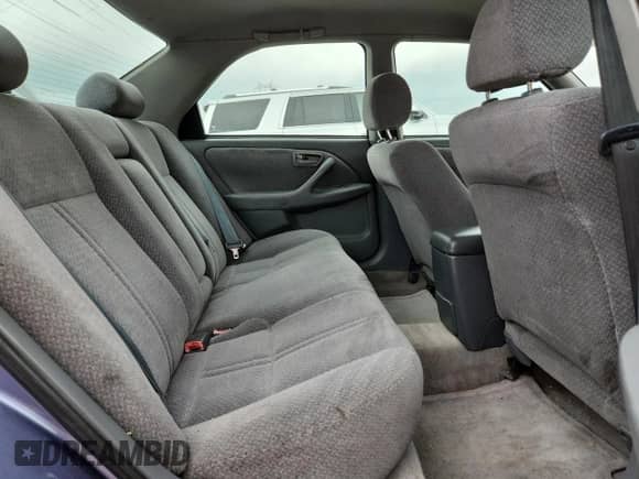 2000 Toyota Camry CE z VIN 4T1BG22K6YU640776, wystawiony jako Copart lot #82269245 z przebiegiem 227 864 mil mil oraz Szkoda całkowita • Salvage title. Historia ofert i sprzedaży dostępna na DreamBid. Obrazek 10.