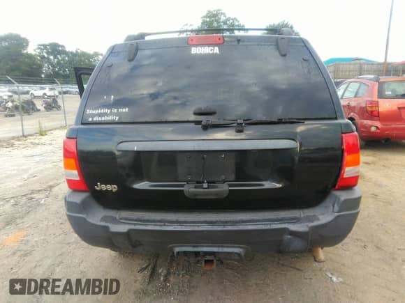 2003 Jeep Grand Cherokee Laredo z VIN 1J4GX48S53C543557, wystawiony jako IAAI lot #43123734 z przebiegiem 312 304 mil mil oraz . Historia ofert i sprzedaży dostępna na DreamBid. Obrazek 6.