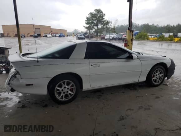 2001 Chevrolet Camaro с VIN 2G1FP22K612111256, выставлен на аукционе Copart как лот 56047085 с пробегом 202 619 миль миль и Списание • Salvage title. История ставок и продаж доступна на DreamBid. Изображение 3.