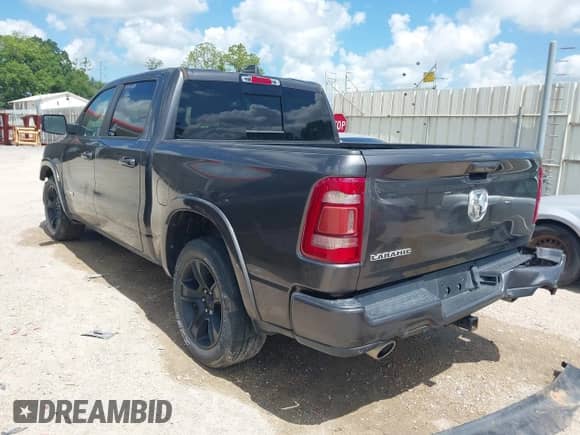 2019 Ram 1500 Laramie with VIN 1C6RREJT9KN740596, listed as a IAAI auction lot 42569812 with 60,265 mi miles and . Bid and sale history available at DreamBid. Image 3.