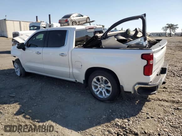 2023 Chevrolet Silverado 1500 LTZ with VIN 1GCUDGE82PZ236474, listed as a Copart auction lot 83958695 with 40,222 mi miles and Salvage title. Bid and sale history available at DreamBid. Image 2.