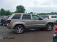 2006 Jeep Grand Cherokee Laredo z VIN 1J4HR48N46C259964, wystawiony jako IAAI lot #42698023 z przebiegiem 201 624 mil mil oraz . Historia ofert i sprzedaży dostępna na DreamBid. Obrazek 14.