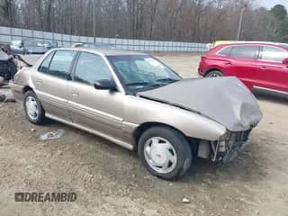 1997 Pontiac Grand Am SE z VIN 1G2NE52T1VC761092, wystawiony jako IAAI lot #41547391 z przebiegiem 297 392 mil mil oraz . Historia ofert i sprzedaży dostępna na DreamBid. Obrazek 1.