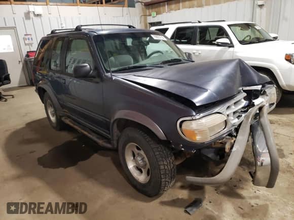 1999 Ford Explorer Sport с VIN 1FMYU24E5XUC26073, выставлен на аукционе Copart как лот 86696925 с пробегом 179 188 миль миль и На запчасти • Non repairable. История ставок и продаж доступна на DreamBid. Изображение 4.