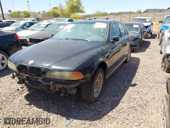 1999 BMW 5 Series 528i with VIN WBADM6333XBY24603, listed as a IAAI auction lot 42165015 with Not provided miles and . Bid and sale history available at DreamBid. Image 2.