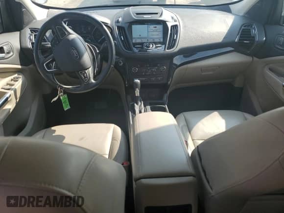 2017 Ford Escape Titanium с VIN 1FMCU0J96HUD56824, выставлен на аукционе Copart как лот 71854385 с пробегом 81 685 миль миль и Списание • Salvage title. История ставок и продаж доступна на DreamBid. Изображение 8.