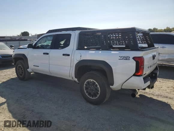 2024 Toyota Tacoma SR5 with VIN 3TMLB5JN4RM050957, listed as a Copart auction lot 71130595 with 1,873 mi miles and Salvage title. Bid and sale history available at DreamBid. Image 2.