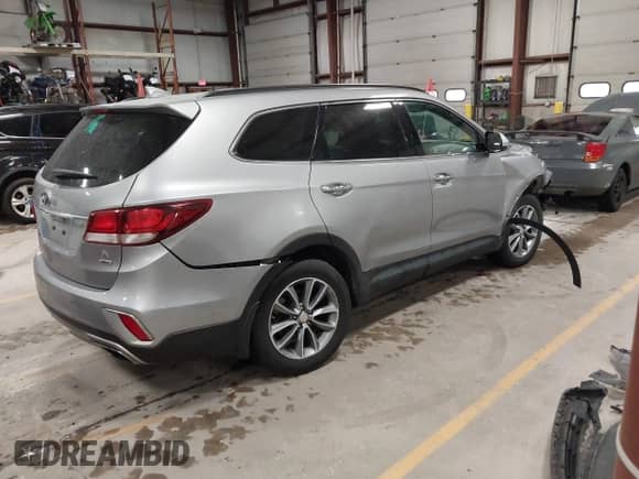 2019 Hyundai Santa Fe SE with VIN KM8SMDHF9KU303234, listed as a IAAI auction lot 42307110 with 63,202 mi miles and . Bid and sale history available at DreamBid. Image 4.
