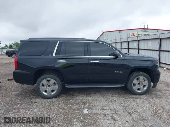 2017 Chevrolet Tahoe LT with VIN 1GNSCBKCXHR342170, listed as a IAAI auction lot 42137766 with 76,854 mi miles and . Bid and sale history available at DreamBid. Image 13.
