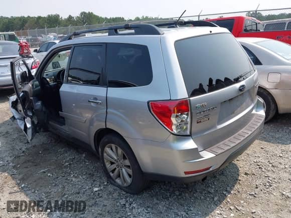 2013 Subaru Forester X Limited with VIN JF2SHAEC2DH441521, listed as a IAAI auction lot 42397403 with 130,000 mi miles and . Bid and sale history available at DreamBid. Image 3.