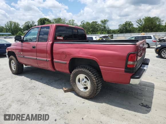 1999 Dodge 1500 with VIN 3B7HF13Y5XG211175, listed as a Copart auction lot 65951345 with 129,271 mi miles and Salvage title. Bid and sale history available at DreamBid. Image 2.