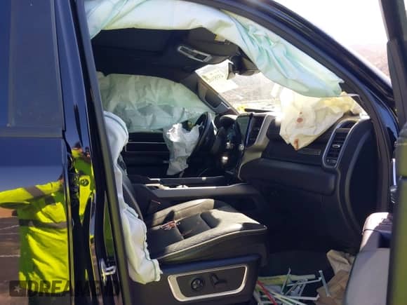 2021 Ram 1500 Laramie with VIN 1C6SRFJTXMN823383, listed as a IAAI auction lot 43353162 with 82,117 mi miles and . Bid and sale history available at DreamBid. Image 5.