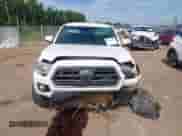 2018 Toyota Tacoma SR5 с VIN 5TFBZ5DN7JX004248, выставлен на аукционе IAAI как лот 42864580 с пробегом 210 482 миль миль и . История ставок и продаж доступна на DreamBid. Изображение 12.