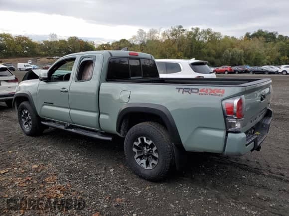 2022 Toyota Tacoma SR z VIN 3TYSZ5AN6NT076787, wystawiony jako Copart lot #86312735 z przebiegiem 22 446 mil mil oraz Szkoda całkowita • Salvage title. Historia ofert i sprzedaży dostępna na DreamBid. Obrazek 2.