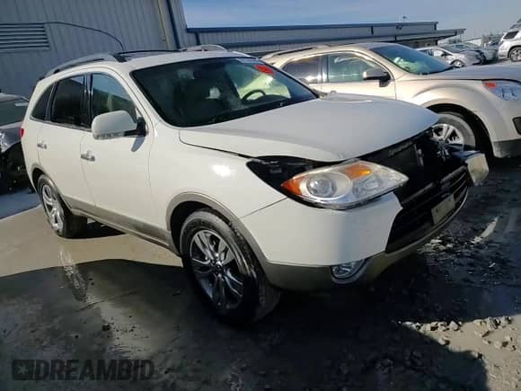 2012 Hyundai Veracruz Limited с VIN KM8NU4CC2CU193901, выставлен на аукционе Copart как лот 82182384 с пробегом 151 346 миль миль и Списание • Salvage title. История ставок и продаж доступна на DreamBid. Изображение 14.