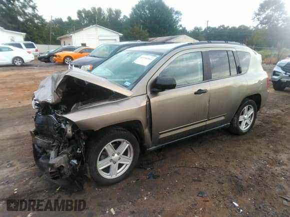 2008 Jeep Compass Sport with VIN 1J8FT47W58D616728, listed as a IAAI auction lot 43398564 with 121,179 mi miles and . Bid and sale history available at DreamBid. Image 17.