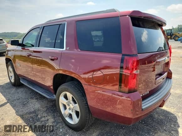 2016 Chevrolet Tahoe LT with VIN 1GNSCBKCXGR311662, listed as a Copart auction lot 65987115 with 168,117 mi miles and Salvage title. Bid and sale history available at DreamBid. Image 2.