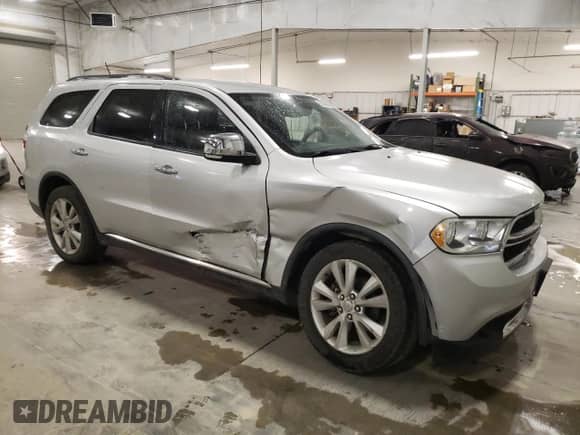 2011 Dodge Durango Crew с VIN 1D4RE4GG3BC638590, выставлен на аукционе Copart как лот 85089465 с пробегом 166 145 миль миль и Списание • Salvage title. История ставок и продаж доступна на DreamBid. Изображение 4.