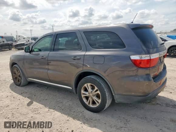 2013 Dodge Durango SXT with VIN 1C4RDHAG0DC692626, listed as a Copart auction lot 70991825 with 214,031 mi miles and Salvage title. Bid and sale history available at DreamBid. Image 2.