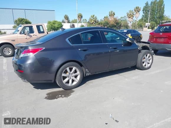 2014 Acura TL Technology z VIN 19UUA8F59EA003076, wystawiony jako IAAI lot #42301365 z przebiegiem 154 974 mil mil oraz . Historia ofert i sprzedaży dostępna na DreamBid. Obrazek 4.