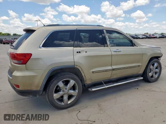 2012 Jeep Grand Cherokee Limited z VIN 1C4RJEBG8CC137430, wystawiony jako Copart lot #62833655 z przebiegiem 133 892 mil mil oraz Szkoda całkowita • Salvage title. Historia ofert i sprzedaży dostępna na DreamBid. Obrazek 3.