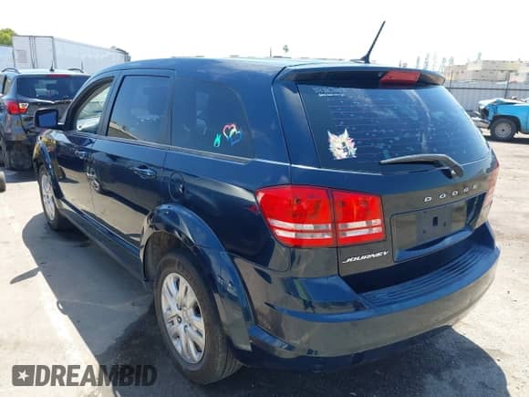 2014 Dodge Journey American Value with VIN 3C4PDCAB1ET287590, listed as a IAAI auction lot 43072351 with 149,217 mi miles and . Bid and sale history available at DreamBid. Image 3.